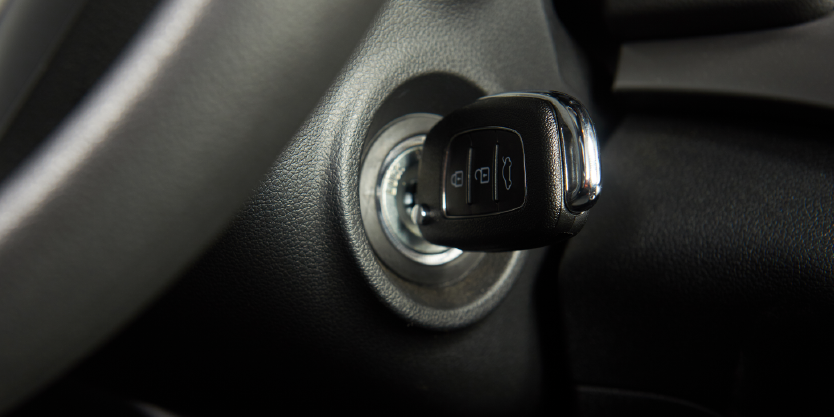 Key in the ignition of a car.